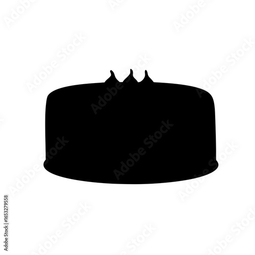 Elegant Black Cake Silhouette with Delicate Topping on a White Background