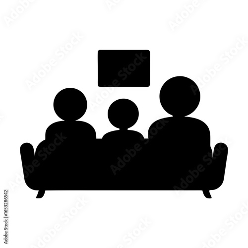 Silhouette of a family of three watching television together on sofa