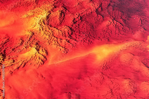 Abstract Red and Orange Landscape with Canyons and Textured Surface