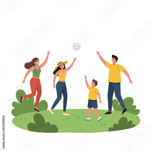 Family playing and having fun together outdoors in a green field happily