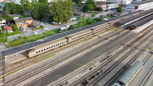 Drone Curved Orbit Over Train at Hat Yai Railway Station Thailand