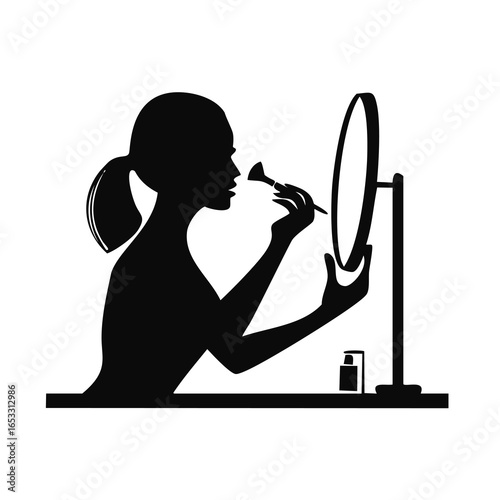 Silhouette of a woman applying makeup with a brush and mirror beauty cosmetic