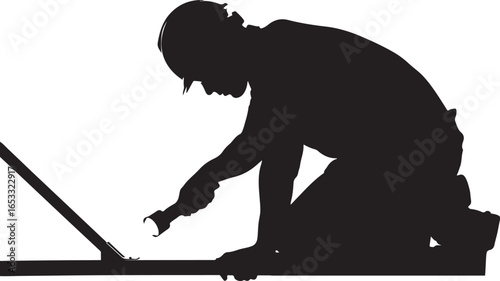 Silhouette of a construction worker in a hard hat using a wrench on a metal beam tool