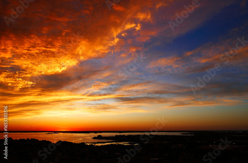Breathtaking Orange and Red Sunset over the Bay in Ocean City, Maryland