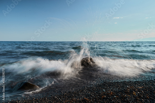 waves crashing on rocks