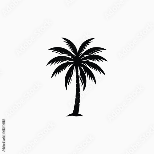 Black silhouette of a palm tree tropical beach