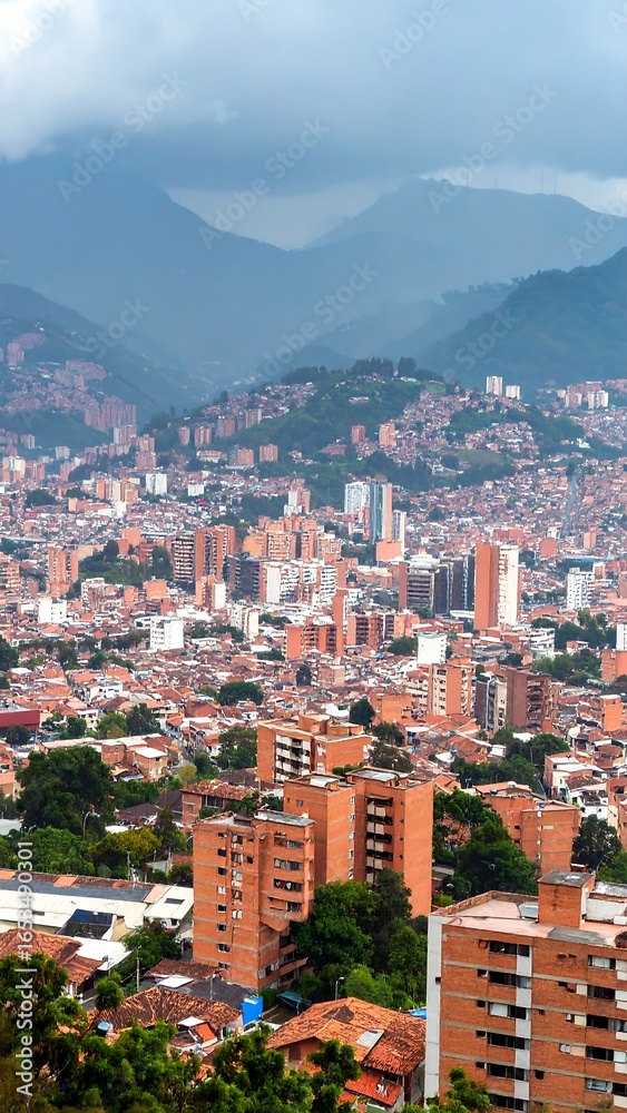Fototapeta premium Cityscape view of a densely populated urban area nestled within a mountainous region