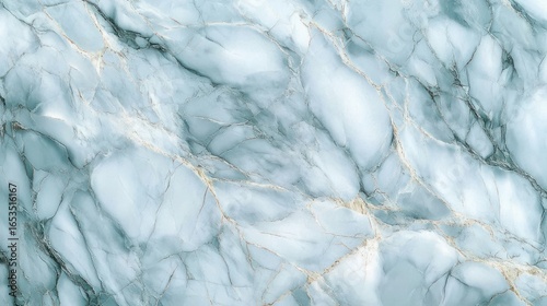 Smooth marble surface with subtle light blue and white tones featuring natural veins and intricate cracks creating an elegant and calming effect