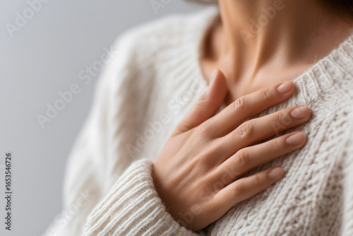 Close-up of a Woman’s Hand on Her Chest Generating AI