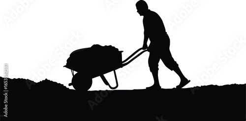 Silhouette of a worker pushing a wheelbarrow with construction material