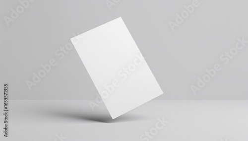 A white card standing upright on a plain gray background