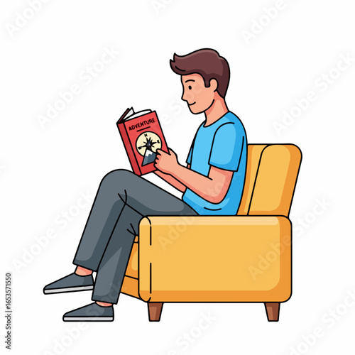 Focused young man engrossed in reading a captivating book while relaxing comfortably