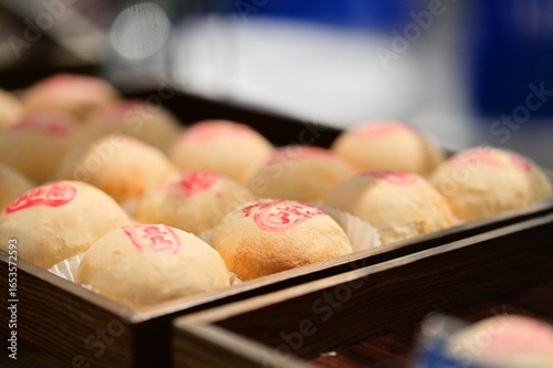 Traditional Taiwanese mung bean pastry Lu Dou Tu with flaky golden layers and sweet filling. Popular Mid-Autumn Festival treat featuring ping-pong ball shape and crispy texture.
