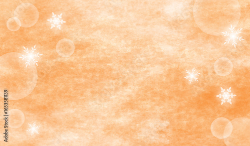 光の輪と雪の結晶の暖かいイメージの背景素材