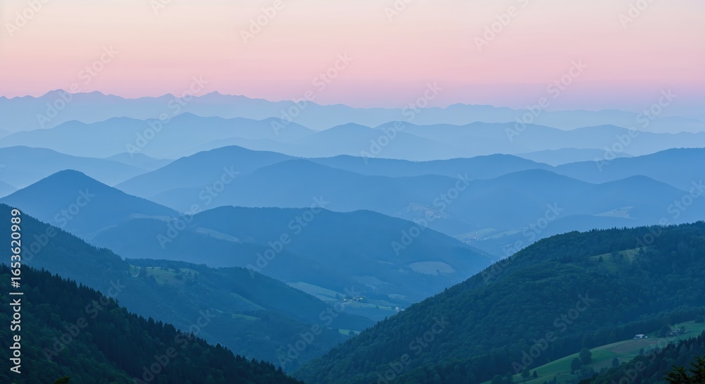 Fototapeta premium Mountain Silhouette at Dusk: A breathtaking landscape unfolds as layers of majestic mountains fade into the horizon under a captivating pastel sky, evoking serenity.
