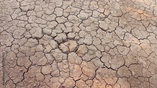 Soil cracked brown top view background