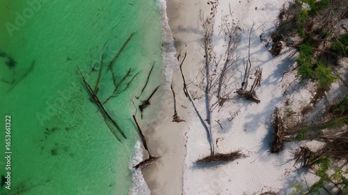 Small waves gently lap the shoreline of Long Boat Key on Florida's gulf coast.
