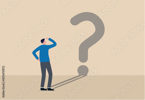 Confusion, uncertainty or self doubt, finding meaning in live, question to answer or searching solution to solve problem concept, curios businessman looking at self shadow as question mark sign.
