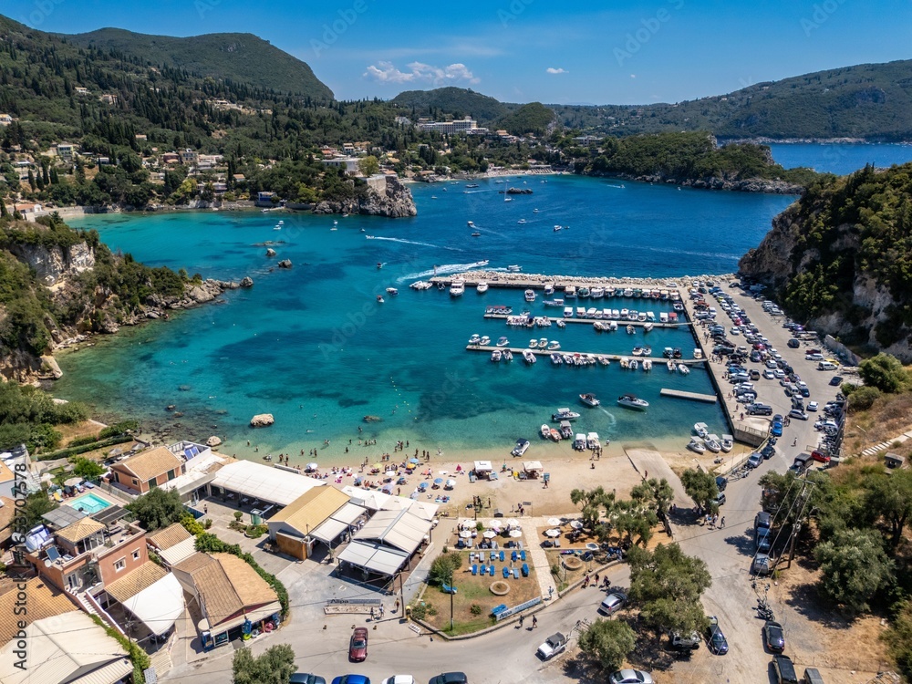 Fototapeta premium Aerial view of a scenic coastal landscape in Paleokastritsa, Corfu, Greece and the Ionian Sea.