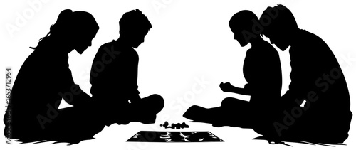 Silhouette of Four People Sitting on Floor Playing Board Game
