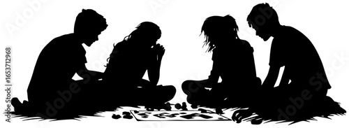 Silhouette of Four People Sitting on Floor Playing Board Game
