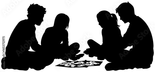 Silhouette of Four People Sitting on Floor Playing Board Game