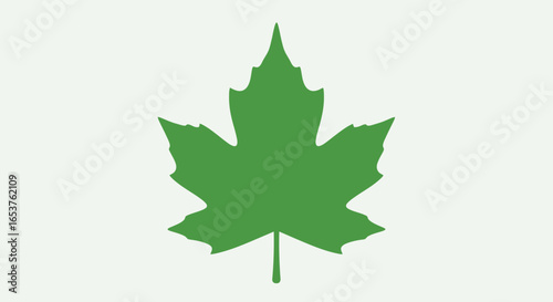 Green Maple Leaf Silhouette on White Background, Symbolizing Nature and Canadian Identity for Graphic Design and Patriotic Visuals