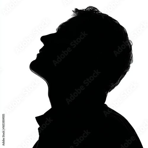 Silhouette of a person looking upwards against a white background, conveying themes of contemplation and introspection.