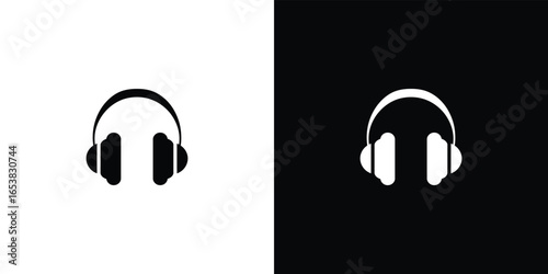 Minimalist headphones icon on black and white backgrounds