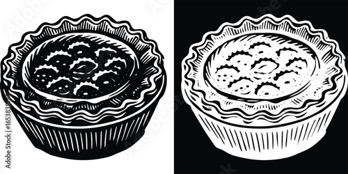Two delicious mini pies, dessert pastries with yummy filling in black and white, ready to serve