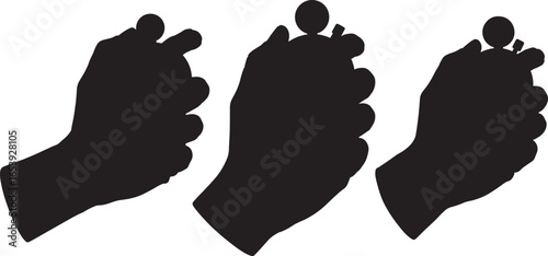 Three hands holding small round objects in silhouette
