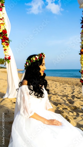 Bride on beach, floral crown, white dress