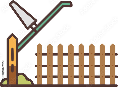 Garden hoe leaning on a wooden fence on a white background