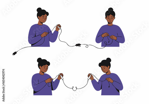 Person connecting and managing electronic cables, headphones, and audio devices.