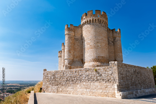 Peñafiel, Valladolid, Spain – View of the medieval castle on a sunny summer day, showcasing its towers and historical heritage.