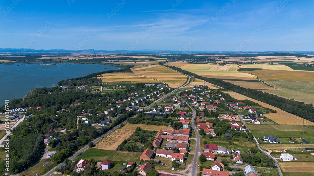 Fototapeta premium View from above of the settlement Poland, Mietkow, Bozhigniew. Drone view.