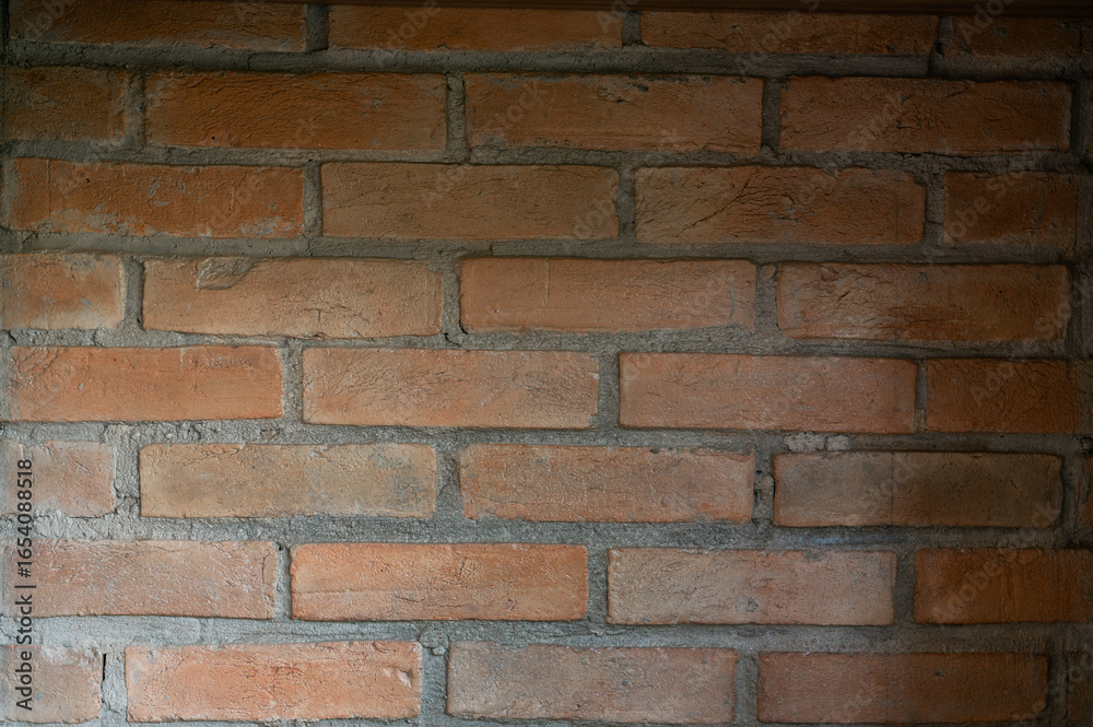 Fototapeta premium Old red brick wall background with textured surface