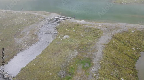 Perfect aerial dron view of mountains, clouds, Europe and villages. Bonitas vistas europeas desde montañas, nubes, aldeas, pueblos, las dolomitas. Lagos