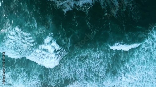 natural texture of Blue ocean sea texture with waves foam surface. nature drone top aerial view background
