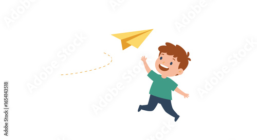 A young boy joyfully chases a yellow paper airplane which is indicated by a dotted line trail
