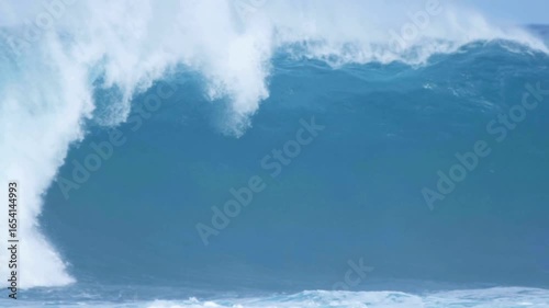 Big breaking Ocean wave Huge Rolling waves hits Hard on Shallow Reef stormy. surfing extreme sports