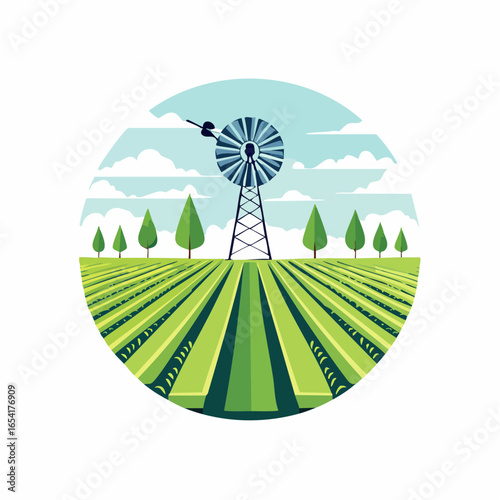 Organic farm field with cultivated row crops and rustic windmill tower