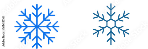 Distinctive snowflakes showcasing unique designs in wintery blue hues against a plain background