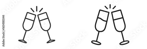 Two glasses clinking together in celebration during a joyful moment at a festive gathering