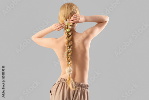 Beautiful young woman with ...