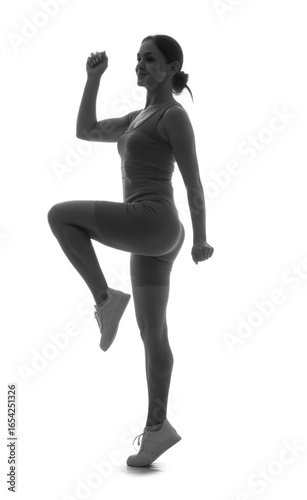 Silhouette of sporty woman ...