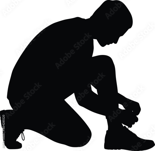 Man kneeling down tying shoelaces preparing for activity silhouette