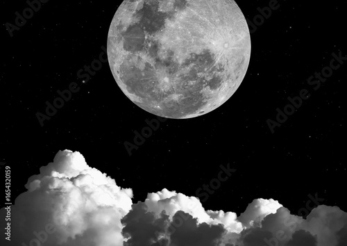White clouds on a full moon background