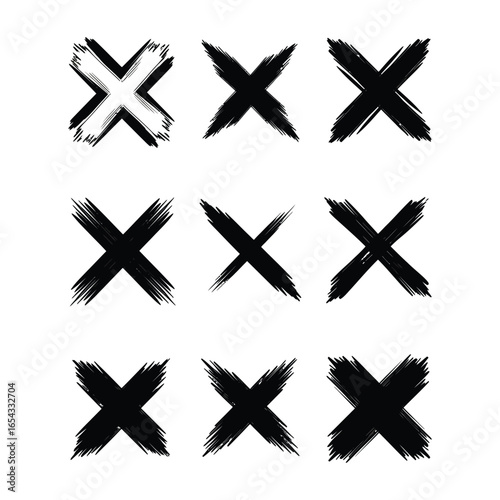 A collection of black brush stroke x marks on a white background
