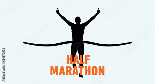 Silhouette of runner crossing finish line at half marathon showcasing victory